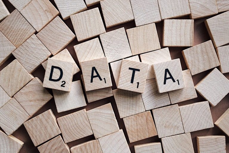 Small wooden blocks with 4 of them spelling the word DATA